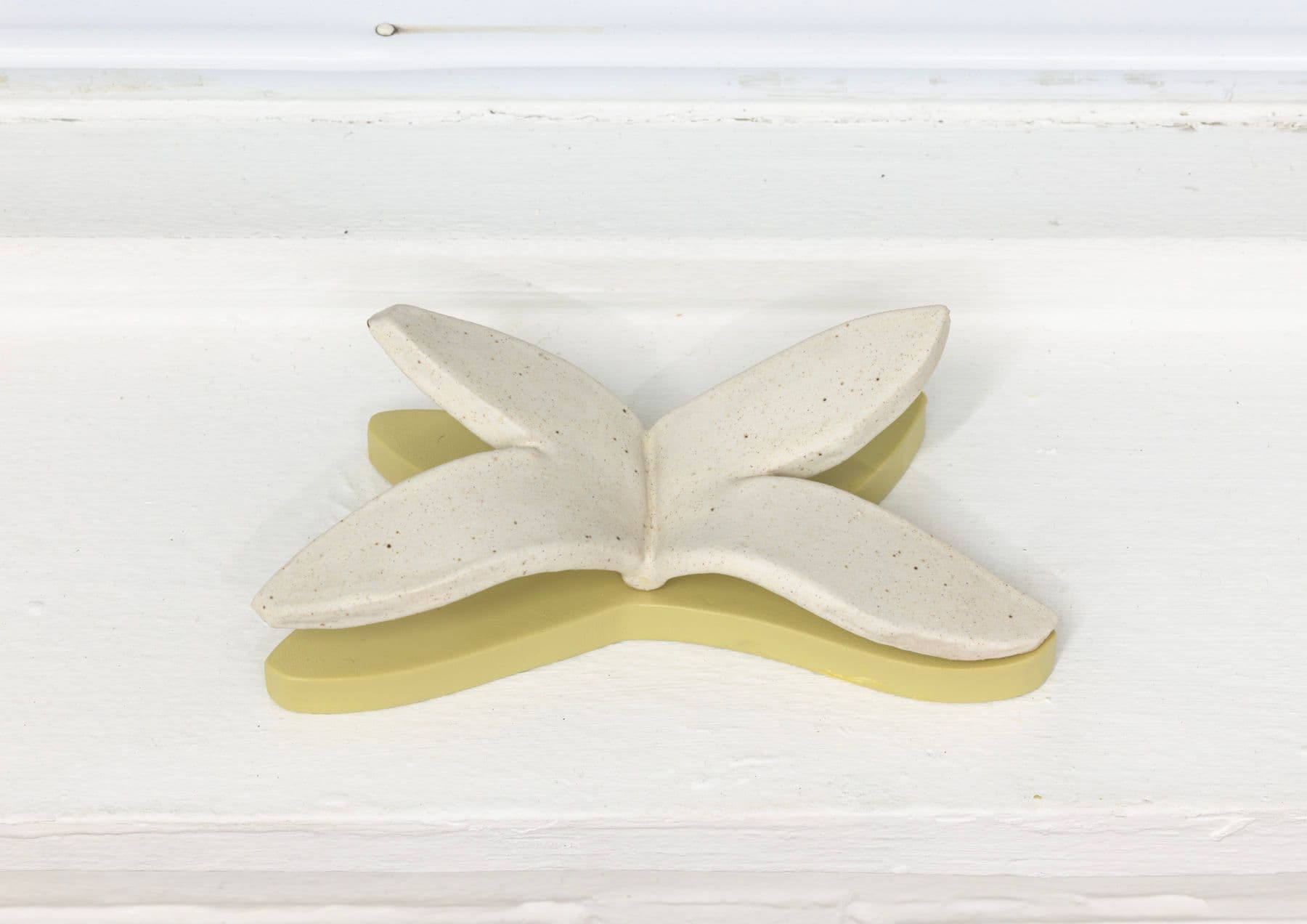 Luz Carabaño. Mariposa en bloom, 2022. Ceramic on wood shelf. 3 x 6 x 1.5 inches.Luz Carabaño. Mariposa en bloom, 2022. Ceramic on wood shelf. 3 x 6 x 1.5 inches.