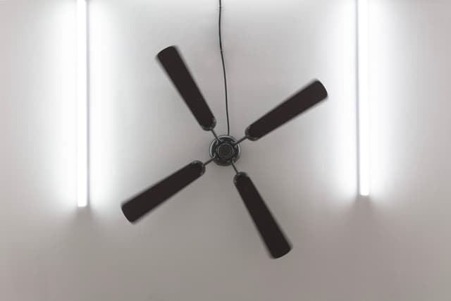 Peggy Chiang. A ceiling fan in the woods, 2022. Urethane resin, wood, 1 rpm AC motor, hardware. 54 x 54 x 8 inches.