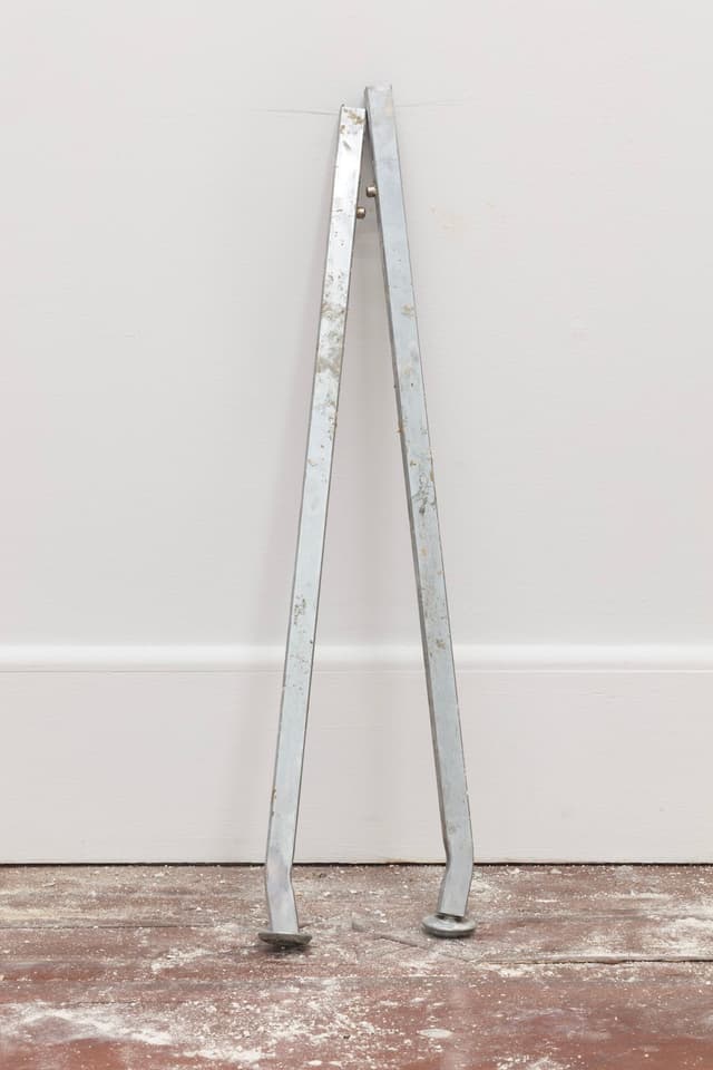 Mo Costello. Untitled (Prosthesis) in Rehearsal, 2021. Metal table legs.