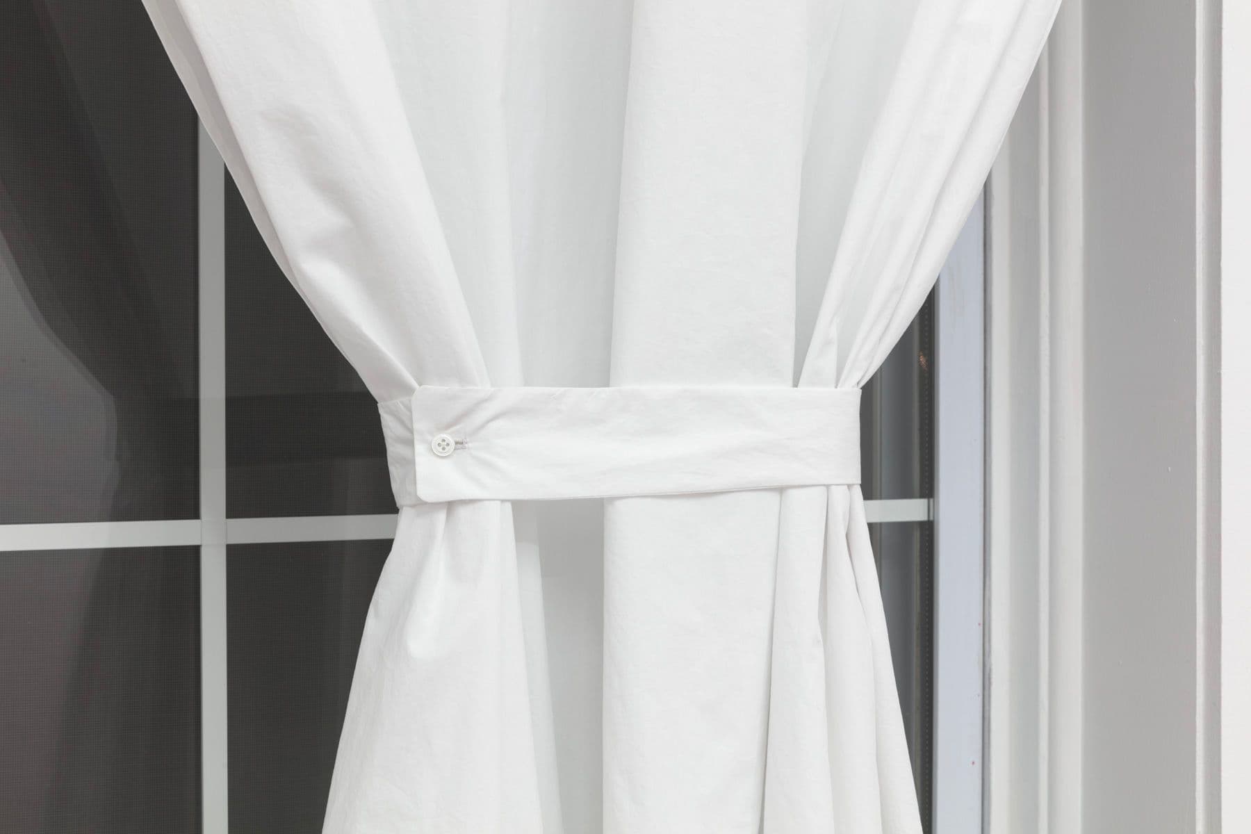 Bea Fremderman. Untitled (Detail), 2021. Cotton, buttons, cufflinks, curtain rod. Dimensions variable.