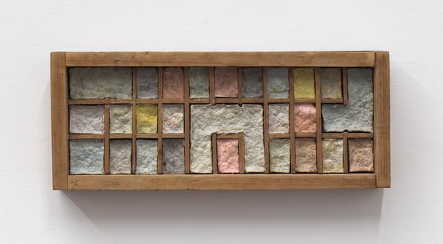 Bronson Smillie. Debris Flow Bungalow, 2022. Modified wooden letter press case, paper pulp. 4 x 9.5 x 1.5 inches.