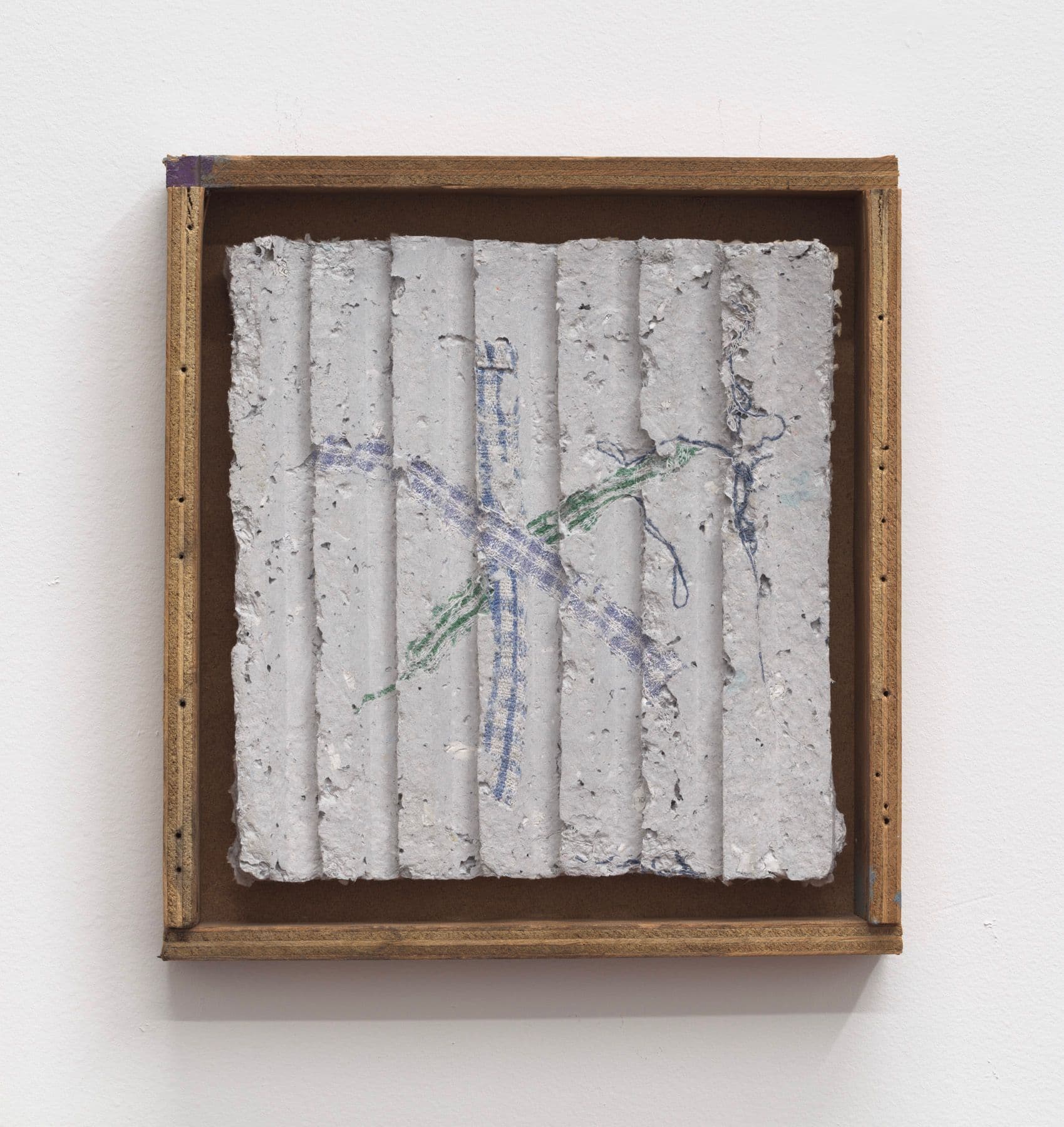 Bronson Smillie. Asterisk to Nowhere #2, 2022. Paper pulp, bar rag, artists frame. 12 x 11 x 1 inches.