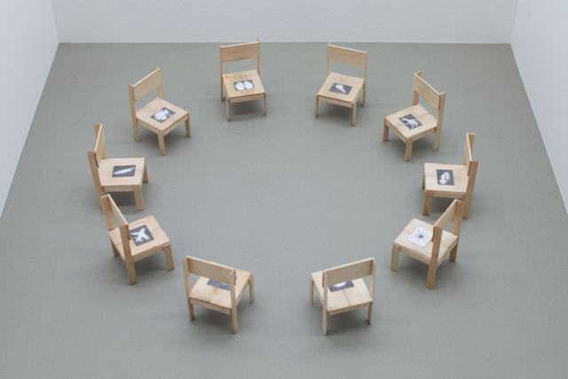 Lai Yu Tong. The World, 2023. 10 birchwood chairs, graphite on paper. 2.75 x 1.5 x 1.5 inches each.