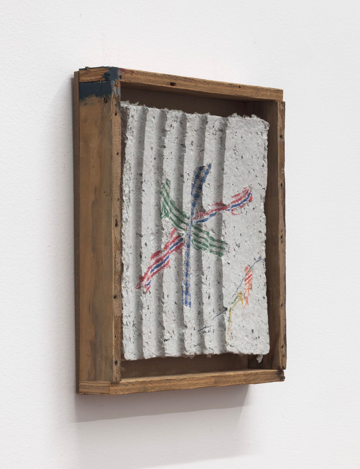 Bronson Smillie. Asterisk to Nowhere #1, 2022. Paper pulp, bar rag, artists frame. 12 x 11 x 2 inches.