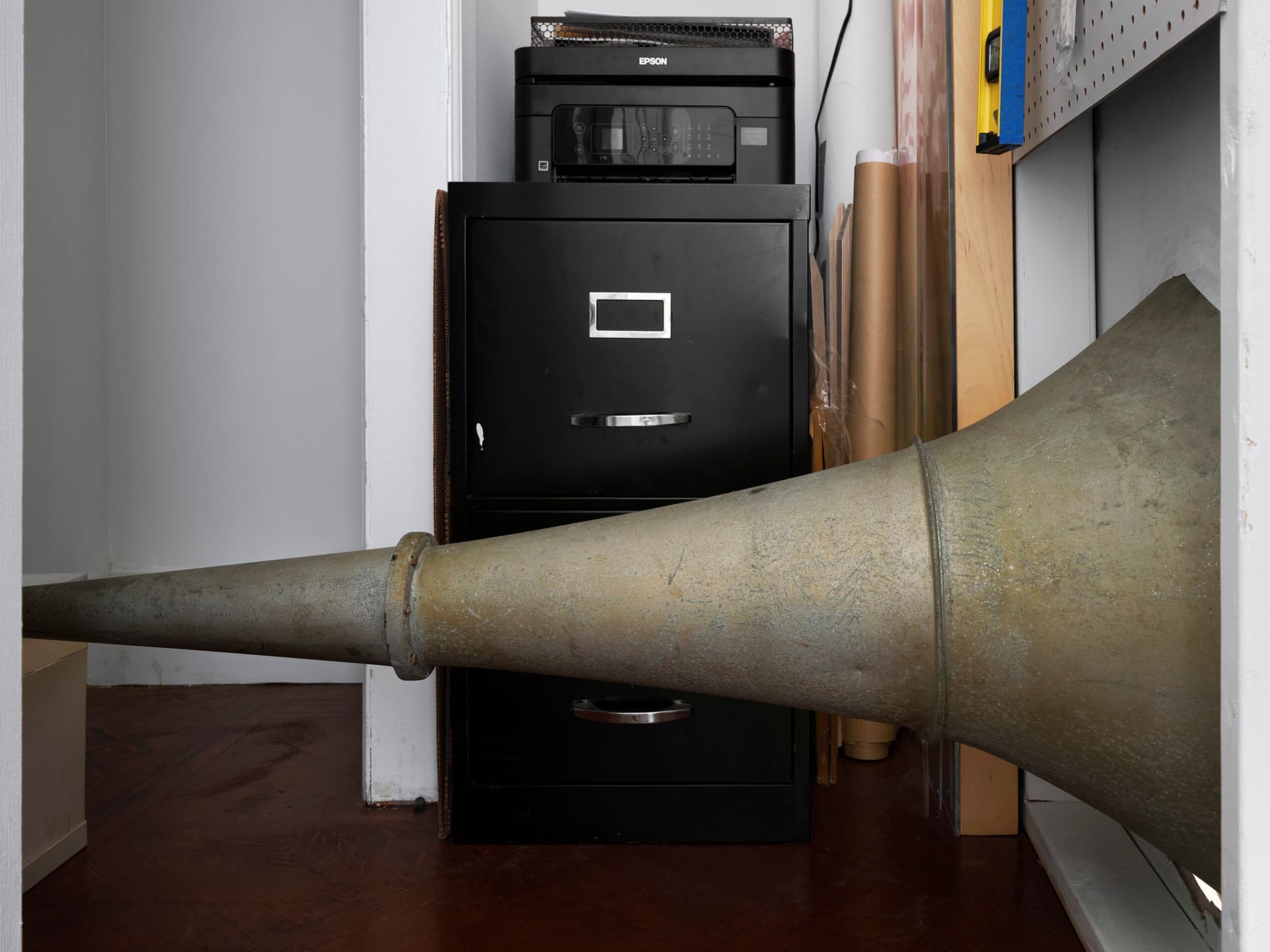 Winona Sloane Odette. Untitled (Detail), 2023. Silver plated dog bowl, phonograph horn, drywall. Dimensions variable.