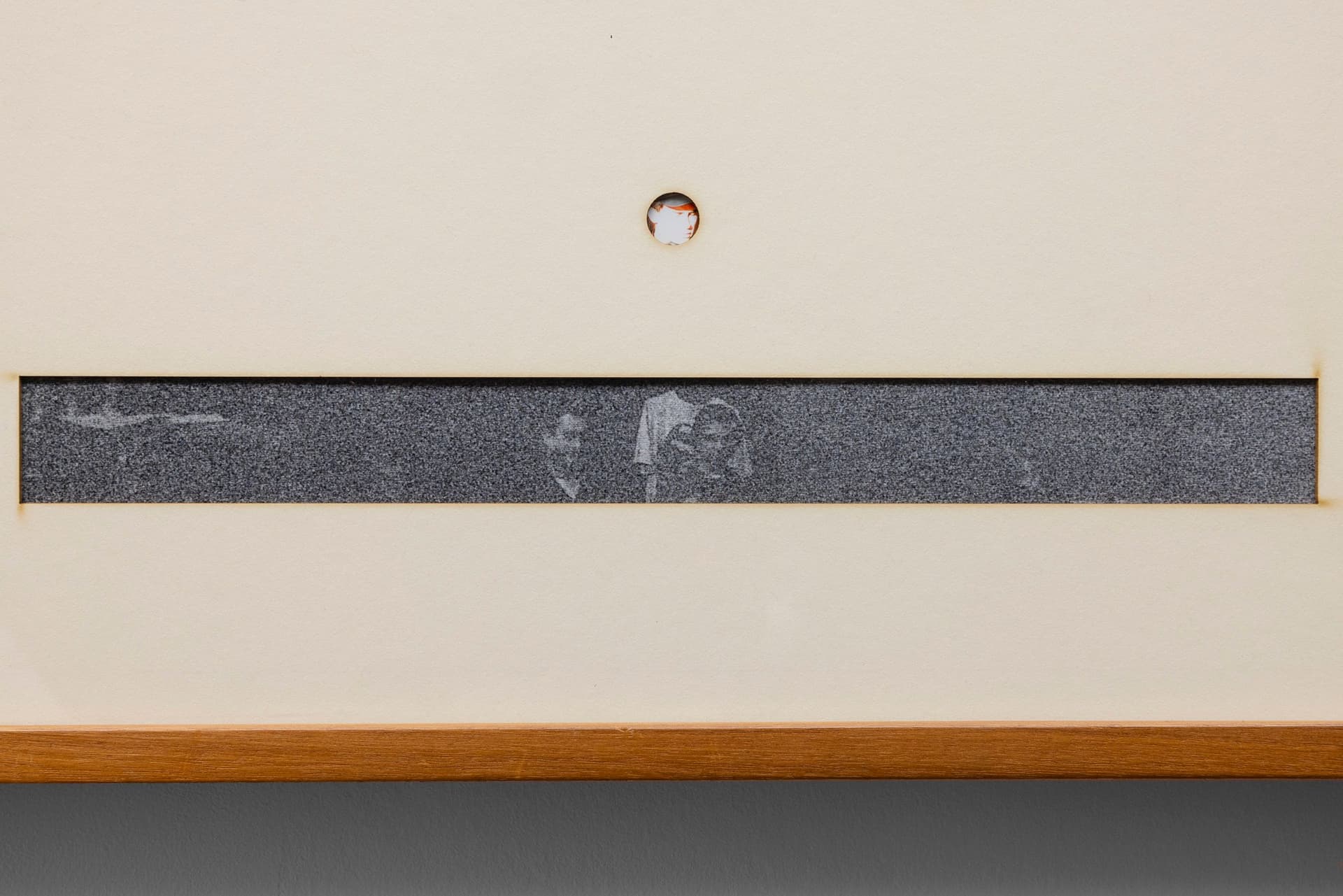 Marisa Kriangwiwat Holmes. Group Setting Compliment (Detail), 2024. 8 individual glossy giclée prints, matboard, found frame. 23 × 16.75 inches.