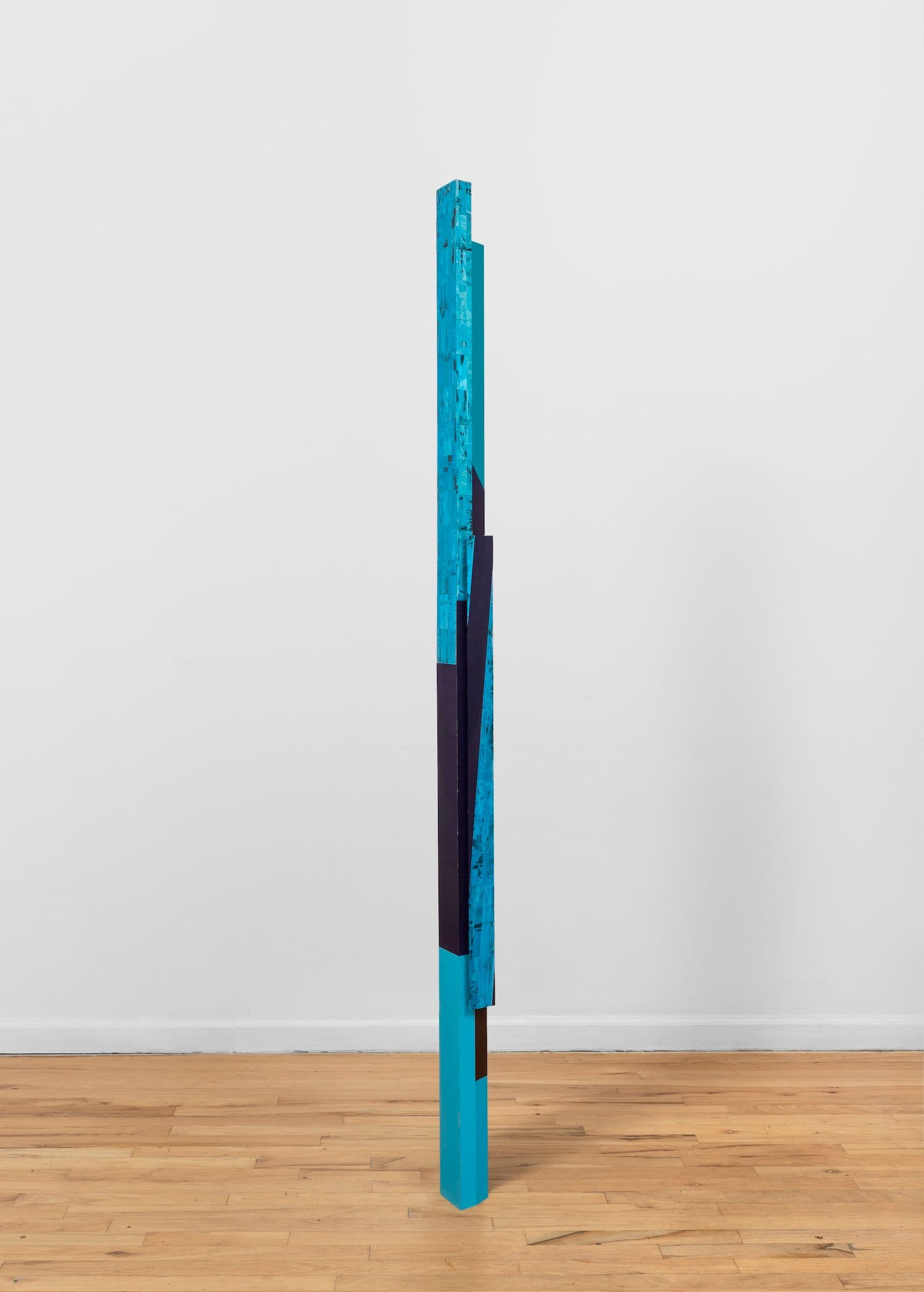 Steph Gonzalez-Turner. <i>Delay Line</i>, 2026. Plywood parquetry with oil paint, acrylic and UV printing, and cast sawdust. 87.5 × 4.25 × 4.25 inches.