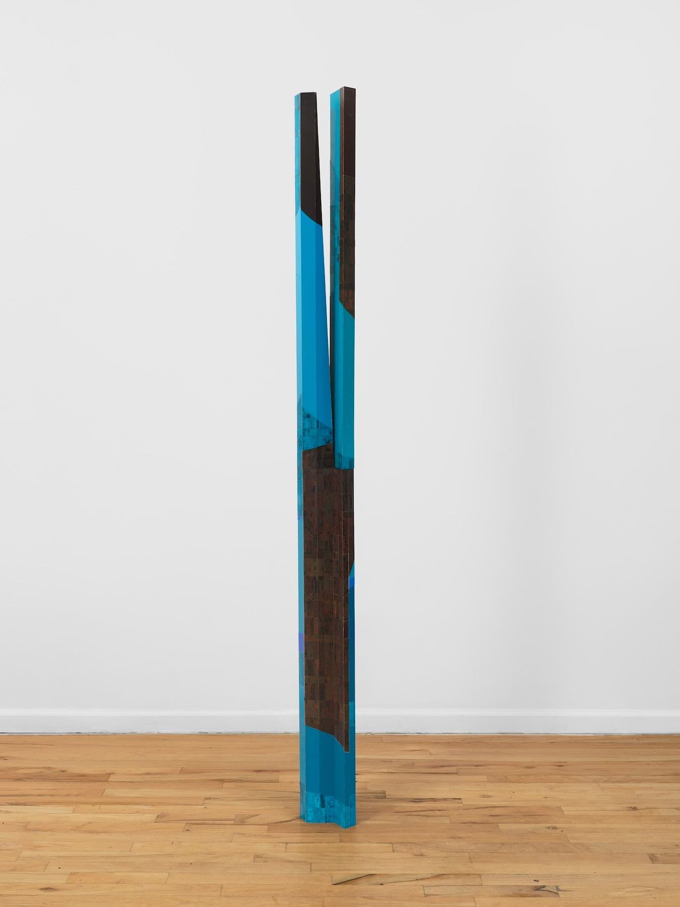 Steph Gonzalez-Turner. <i>Velvet Effect</i>, 2026. Plywood parquetry with oil paint, acrylic and UV printing, and cast sawdust. 84 × 6.5 × 5 inches.