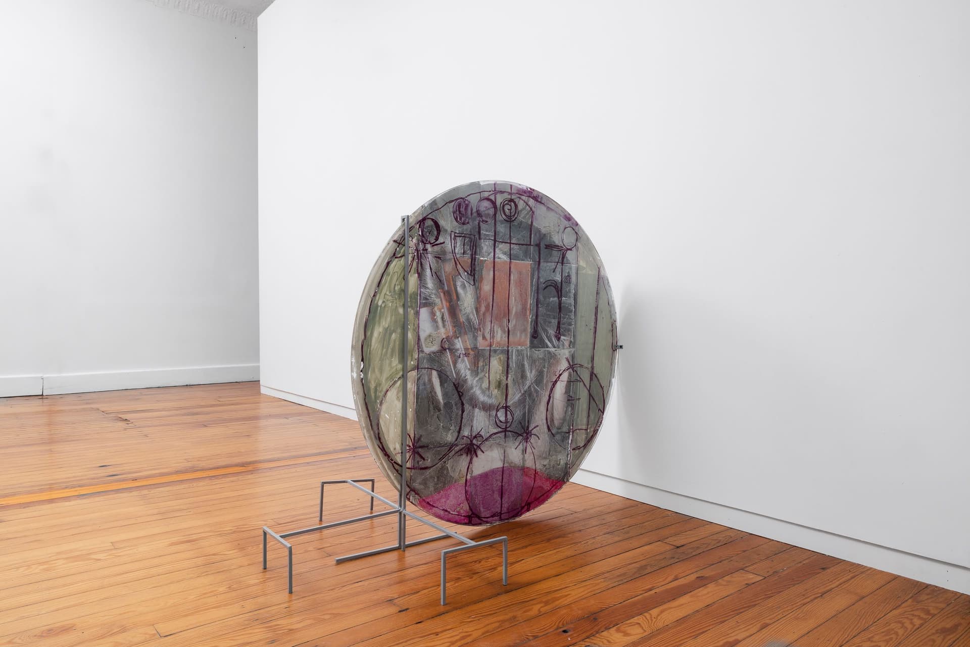 Marisa Kriangwiwat Holmes. Heads - Coin, 2024. Tiled inkjet glossy prints, oil pastel, rice and wheat paste on found glass, iron. 40 × 48 × 27 inches.