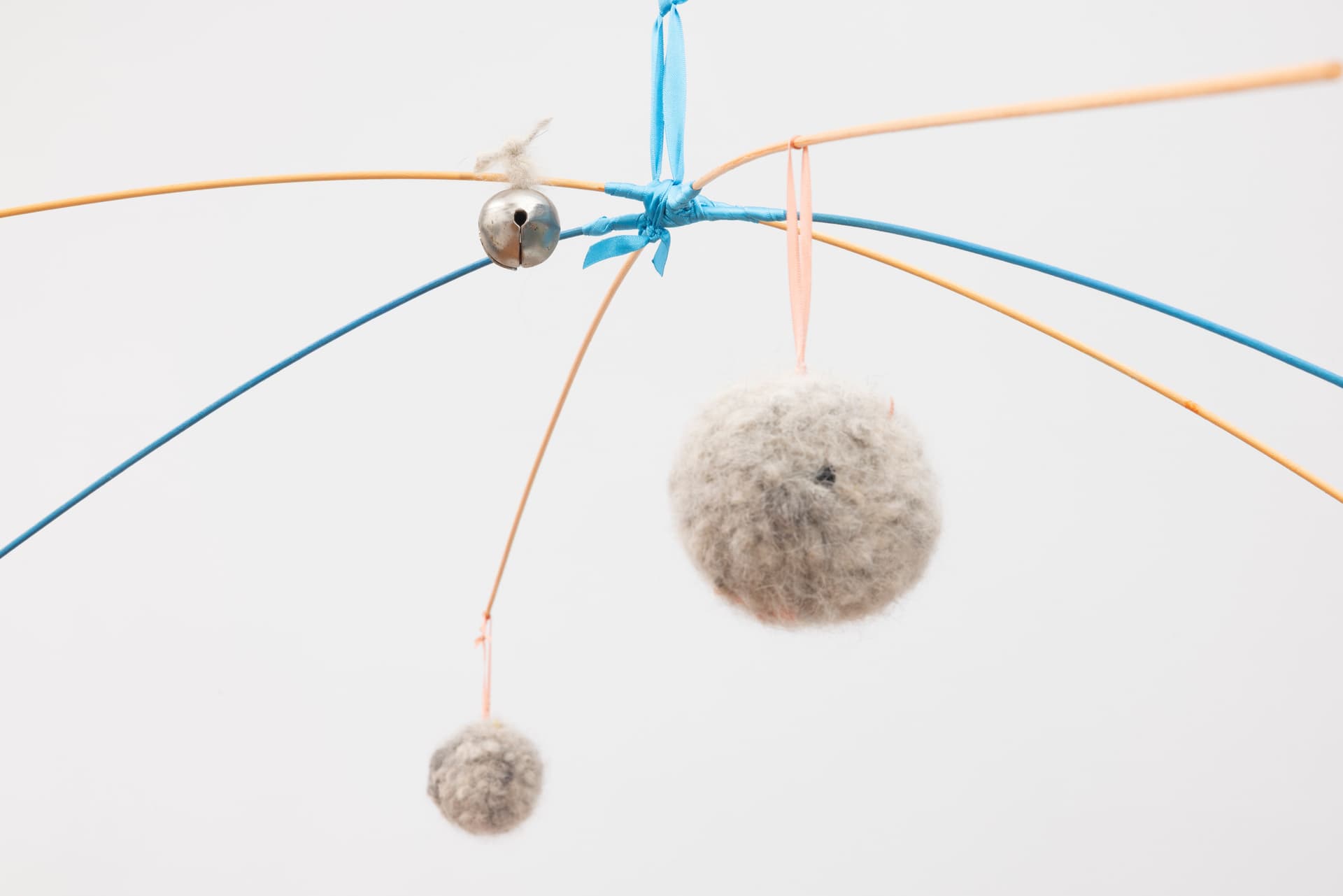 Alix Van Der Donckt-Ferrand. Detail of <i>Une petite cantate, obsédante et maladroite</i>, 2025. Dog fur, wooden dowels, acrylic paint, ribbons. 59 × 45 × 48 inches.
