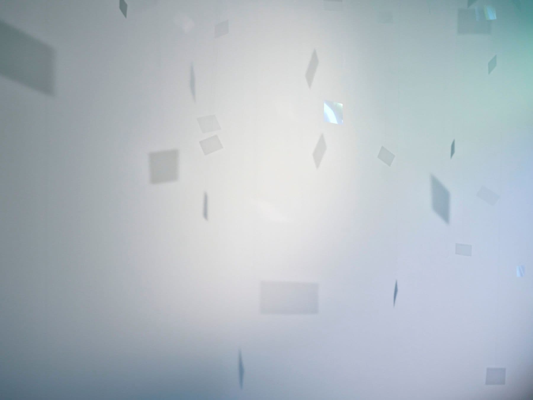 Faye HeavyShield. <i>adrift</i>, 2025. Acetate, string. Dimensions variable. Installation view from <i>Faye HeavyShield: Issokawo'taan</i>, Art Gallery of Ontatio. Photo: Craig Boyko © AGO.