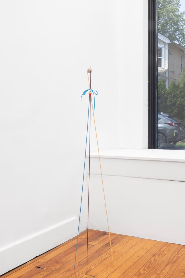 Alix Van Der Donckt-Ferrand. <i>Danseuse - or - valse à 3 temps</i>, 2025. Dog fur, wooden dowels, acrylic paint, ribbons. 49 × 10 × 9 inches.