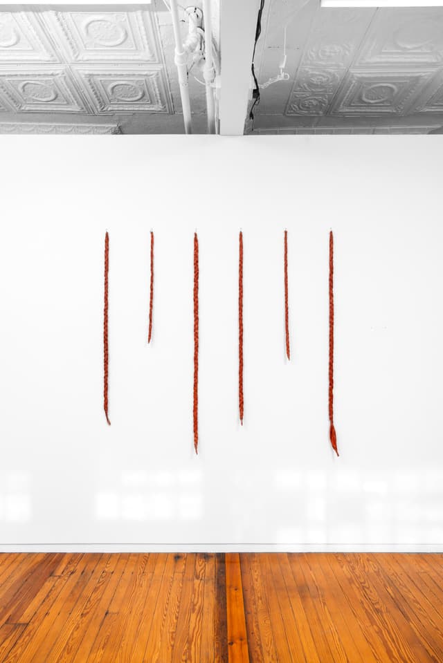 Faye HeavyShield. gravity & ascension, 2026. Acrylic and gesso on paper, wire. 60 × 61 1/2 inches. Dimensions variable.