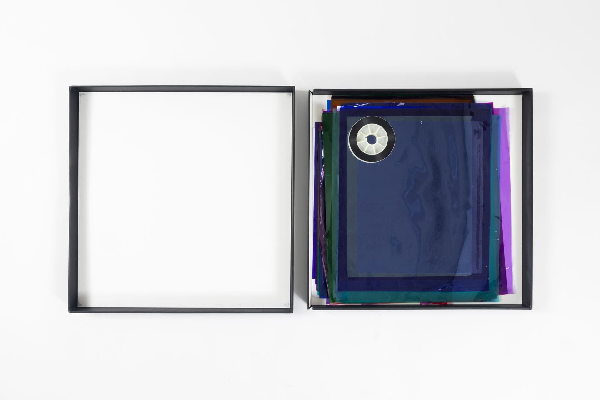 Margaret Honda. Retired Work, 2016-2017. Wildflowers (NG), 2015, color composite 16mm film print, 100 feet on core; Film (Visitor Welcome Center), 2017, 90 Rosco and Lee lighting gels, 2-page score; Film (SpazioA), 2017, 33 Rosco CalColor gels, 1-page score; Film (FAHRBEREITSCHAFT), 2017, 33 Rosco CalColor gels, 2-page score. 2 × 21.75 × 42.75 inches. Courtesy of the artist and Galerie Molitor, Berlin.