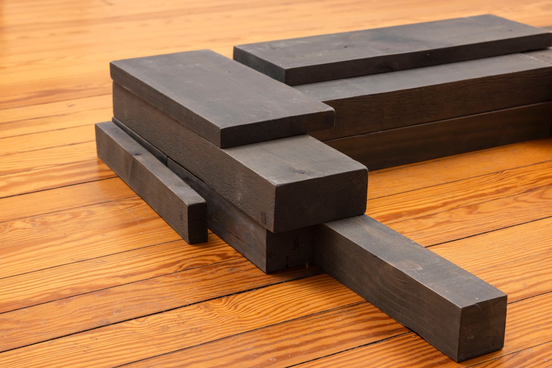 Lai Yu Tong. Dog (Greywash) (Detail), 2025. Emulsion paint on pine wood. 4 3/4 × 31 1/2 × 23 1/2 inches. Courtesy the artist and ShanghART, Singapore.