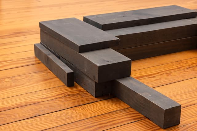 Lai Yu Tong. Dog (Greywash) (Detail), 2025. Emulsion paint on pine wood. 4 3/4 × 31 1/2 × 23 1/2 inches. Courtesy the artist and ShanghART, Singapore.