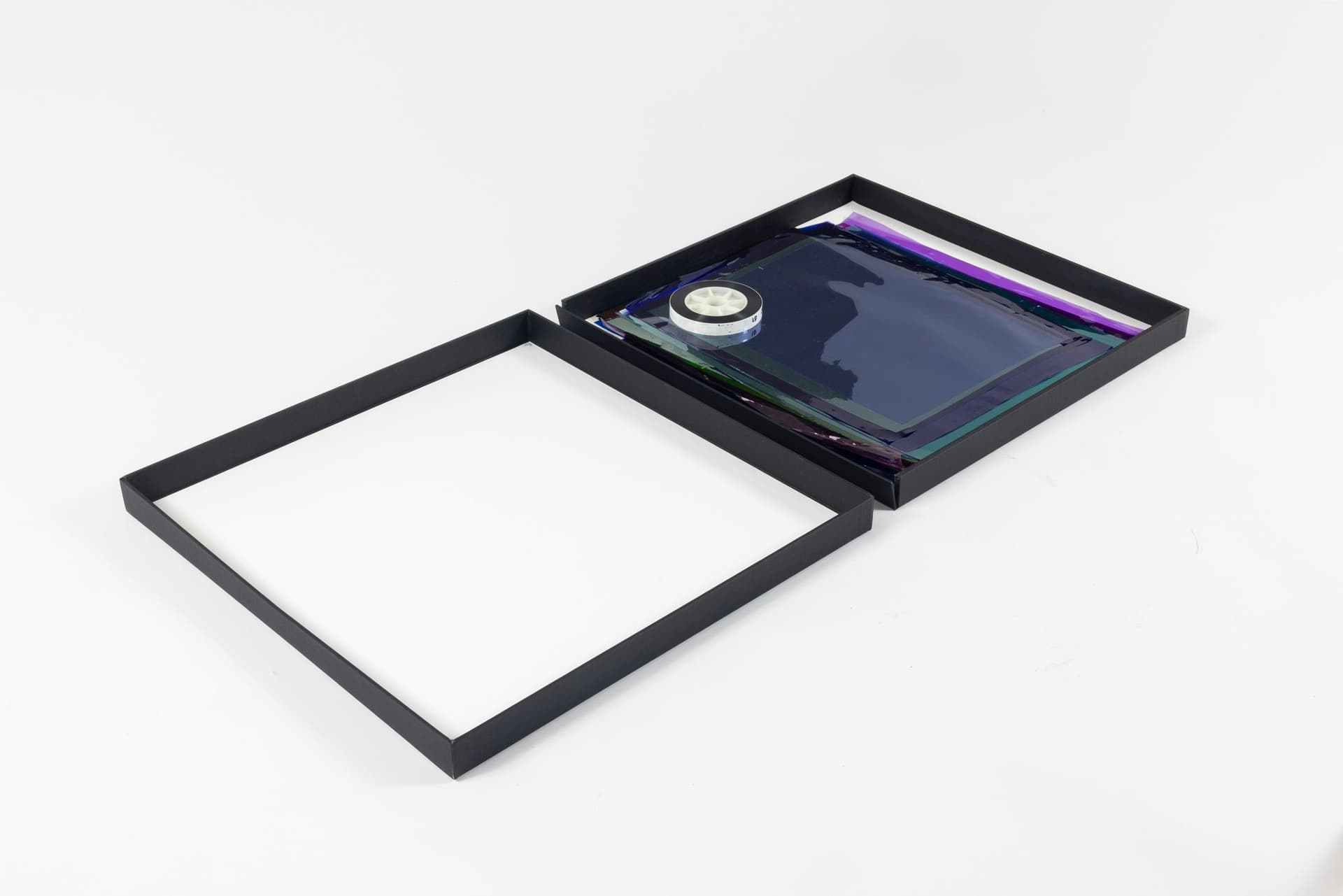 Margaret Honda. Retired Work, 2016-2017. Wildflowers (NG), 2015, color composite 16mm film print, 100 feet on core; Film (Visitor Welcome Center), 2017, 90 Rosco and Lee lighting gels, 2-page score; Film (SpazioA), 2017, 33 Rosco CalColor gels, 1-page score; Film (FAHRBEREITSCHAFT), 2017, 33 Rosco CalColor gels, 2-page score. 2 × 21.75 × 42.75 inches. Courtesy of the artist and Galerie Molitor, Berlin.