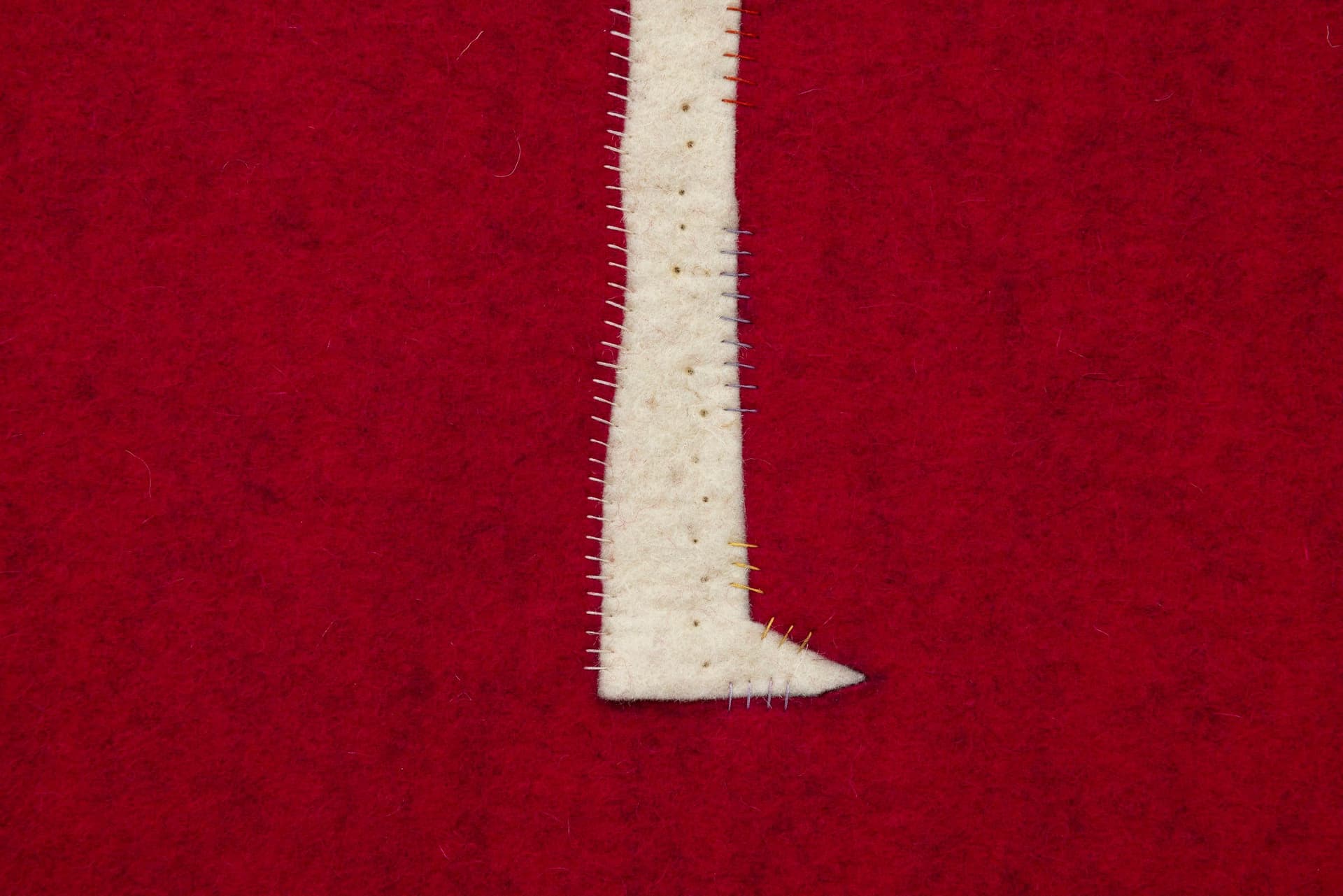 Cyrilla Mozenter. Relic (Detail), 2024. Industrial wool felt hand stitched with silk thread. 68.5 × 20 inches.