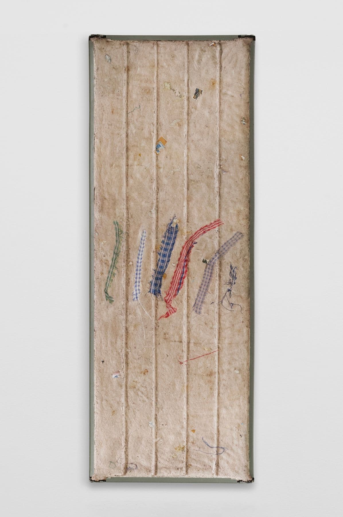 Bronson Smillie. <i>Debris Flow Wall Panel III</i>, 2026. Paper pulp, bar rag, postage stamps, metal shelf. 48 × 18 inches.