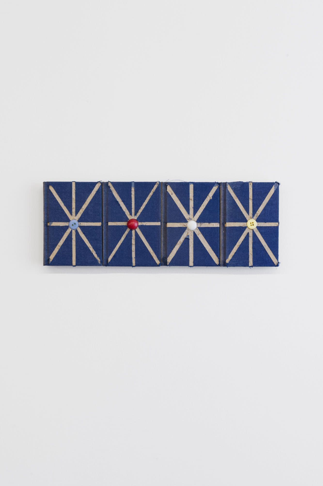 Bronson Smillie. Wisdom, 2025. Mini book box set, buttons. 3.75 x 11 inches.