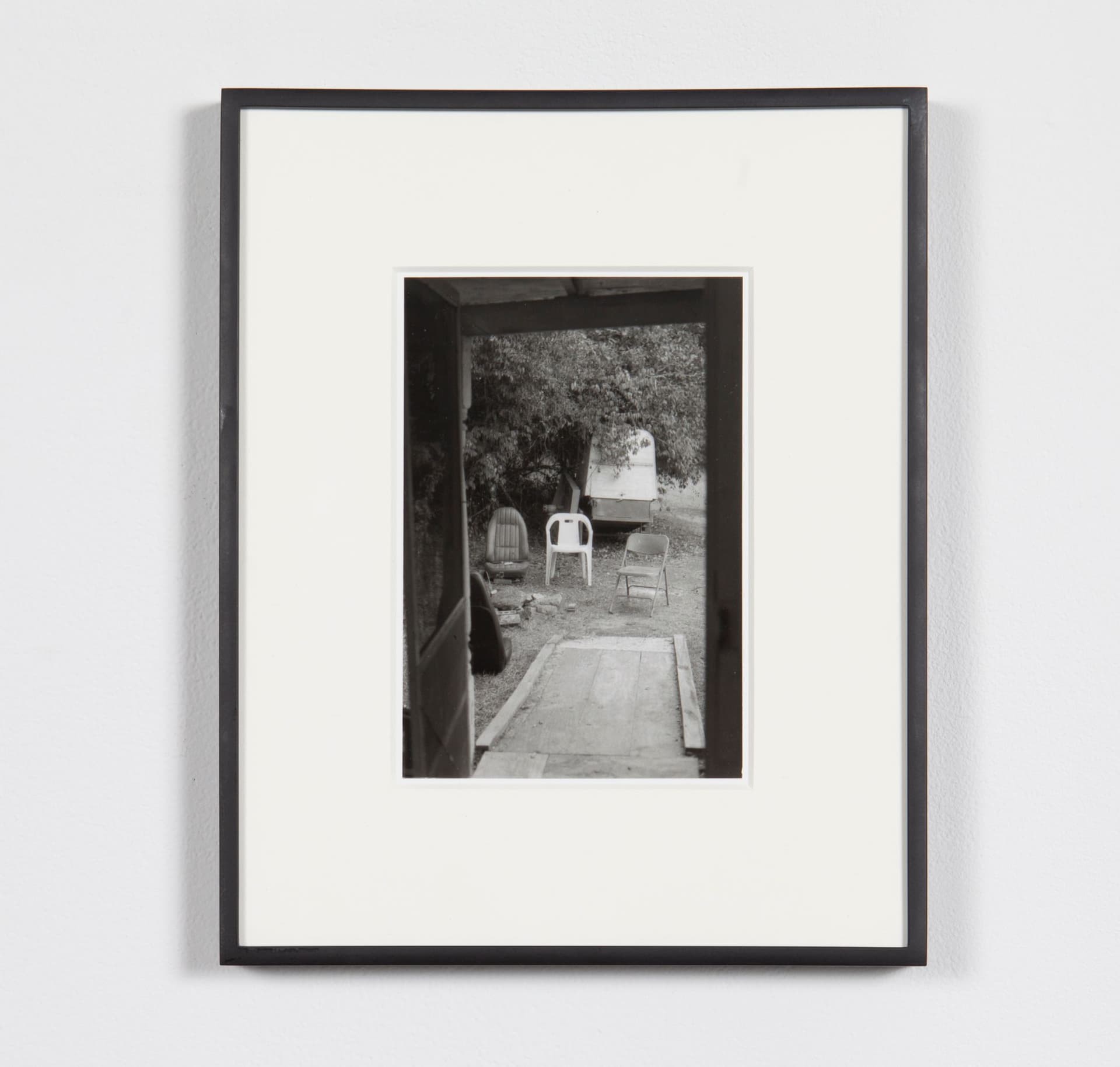 Mo Costello. Untitled (Ramp and Chairs), 2024. Gelatin Silver Print. 5.75 x 4 inches (10 x 8 inches framed).