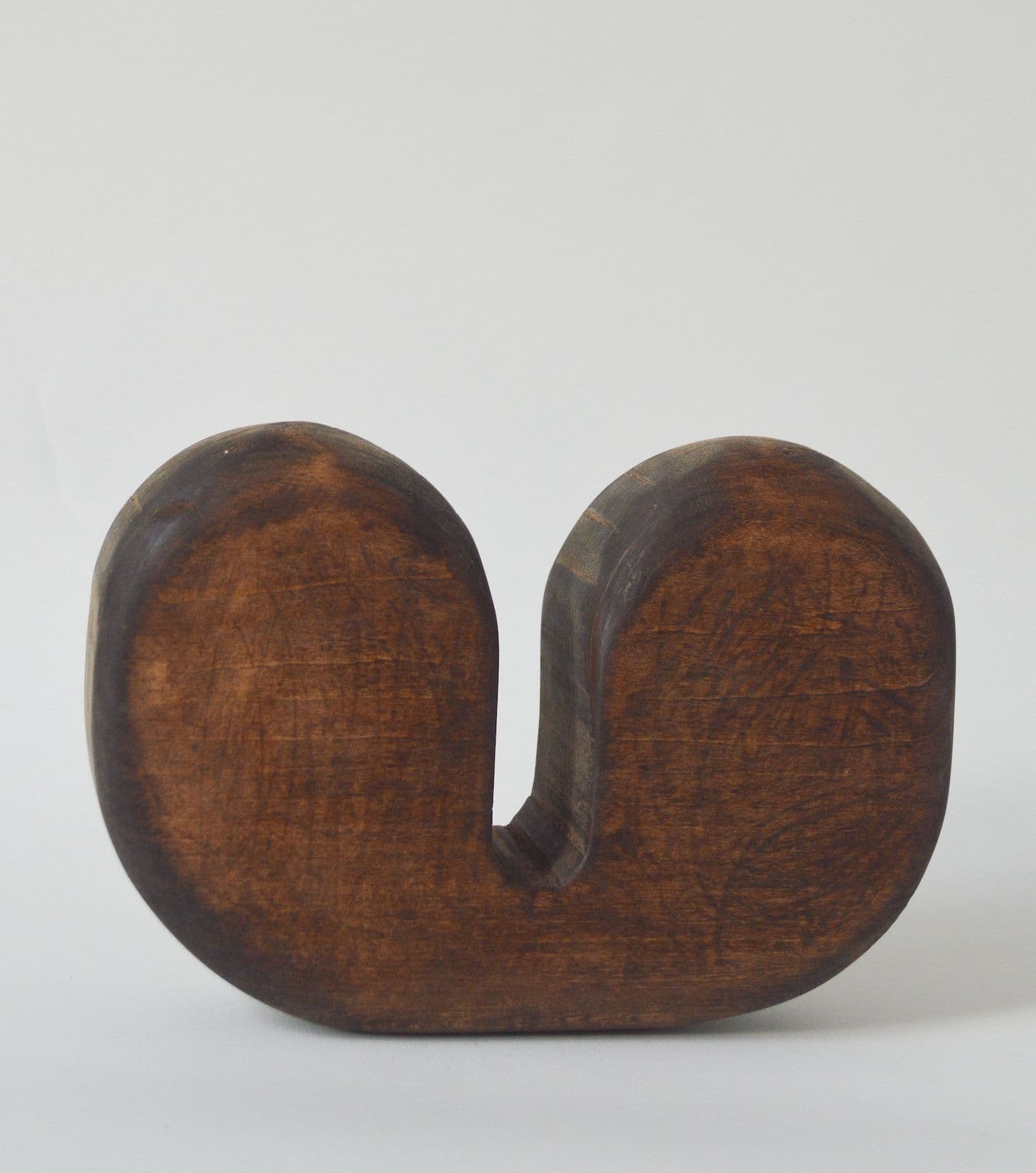 Kai Jenrette. <i>and (37/50)</i>, 2023. Basswood. 5.5 × 8 × 1.75 inches.