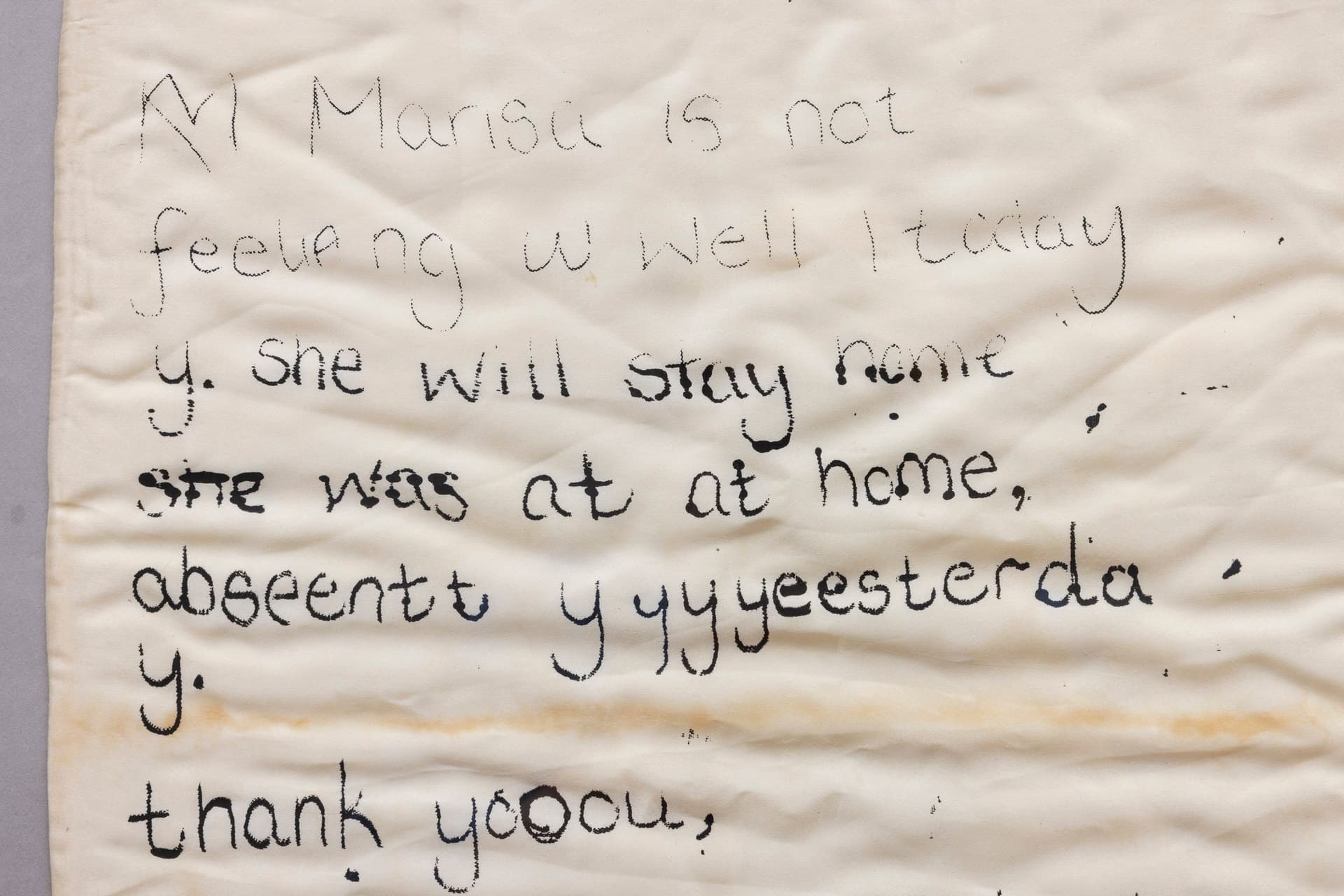 Marisa Kriangwiwat Holmes. Sick Note (Detail), 2024. Silkscreen on silk and lace pillow, hand-colored card stock, acrylic frame. 30.25 × 20.5 inches.