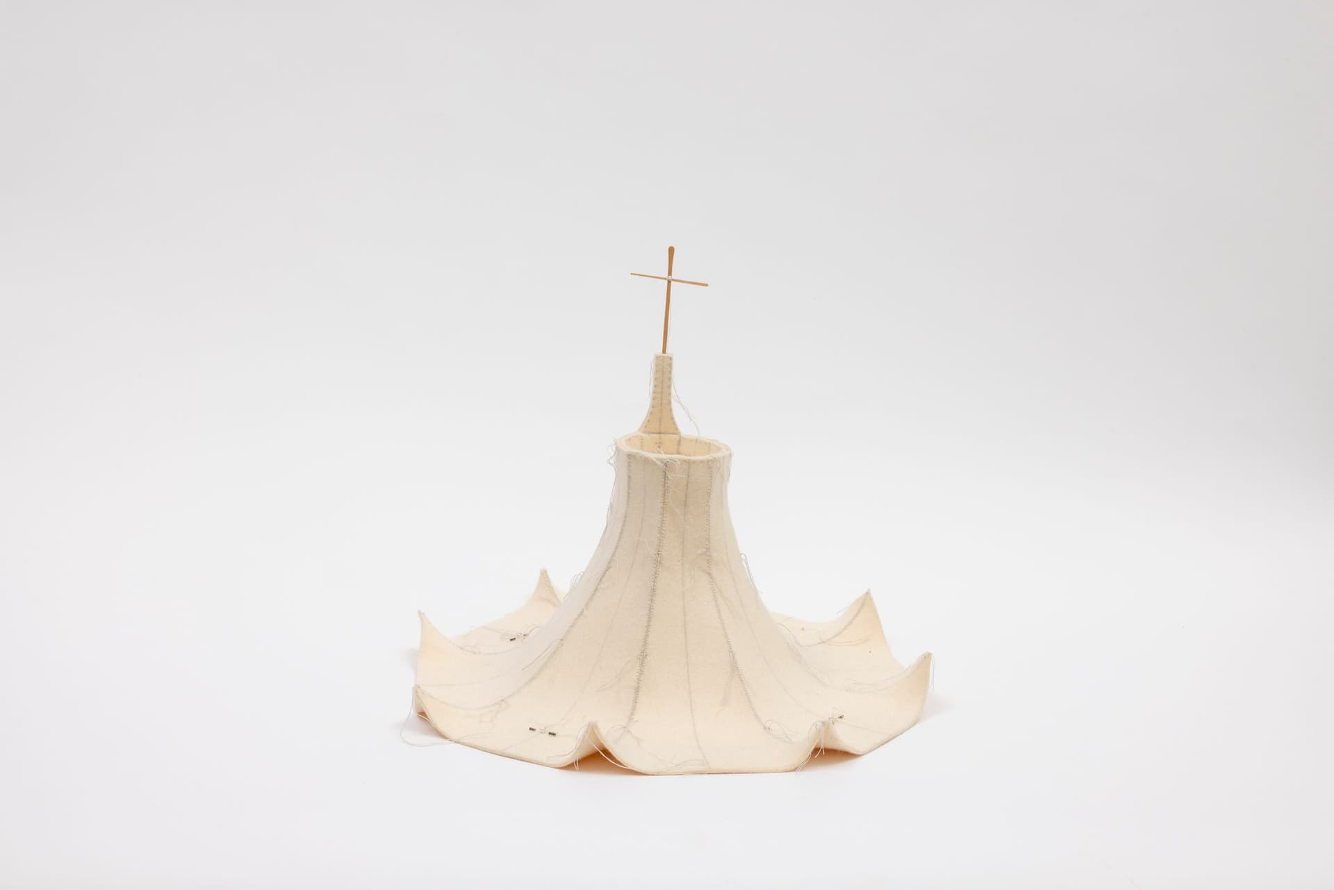 Cyrilla Mozenter. More saints seen 18, 2004. Pencil on industrial wool felt hand stitched with silk thread, wooden craft stick and toothpick, button, pearls, and bugle beads. 13.5 × 16 × 16 inches.