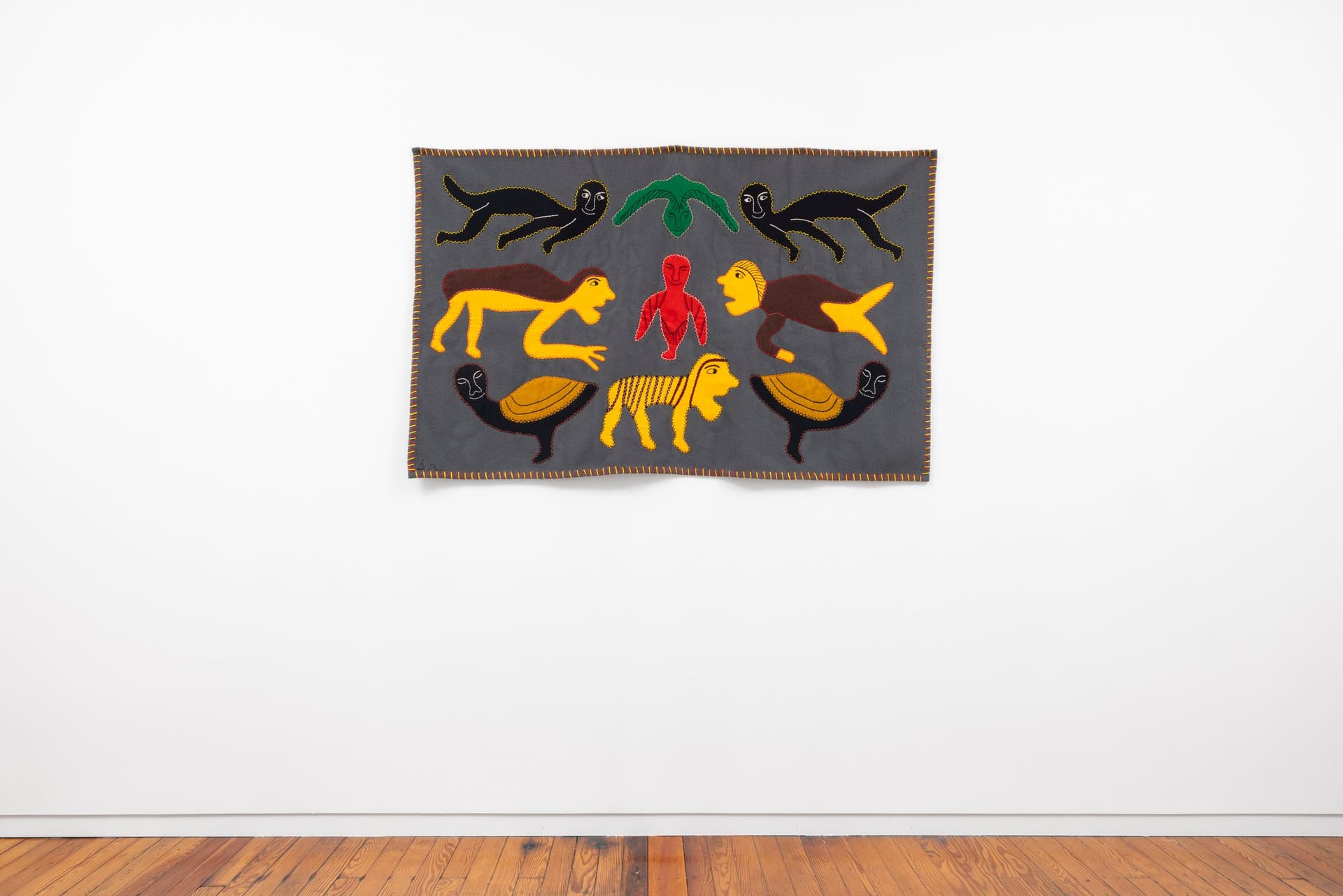 Irene Avaalaaqiaq Tiktaalaaq. COMPOSITION (TRANSFORMATIONS), c. 1990s. Duffel, felt, embroidery floss. 36.75 × 58.25 inches.